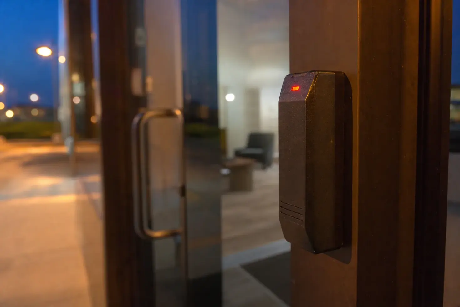 Access control card reader beside an office door